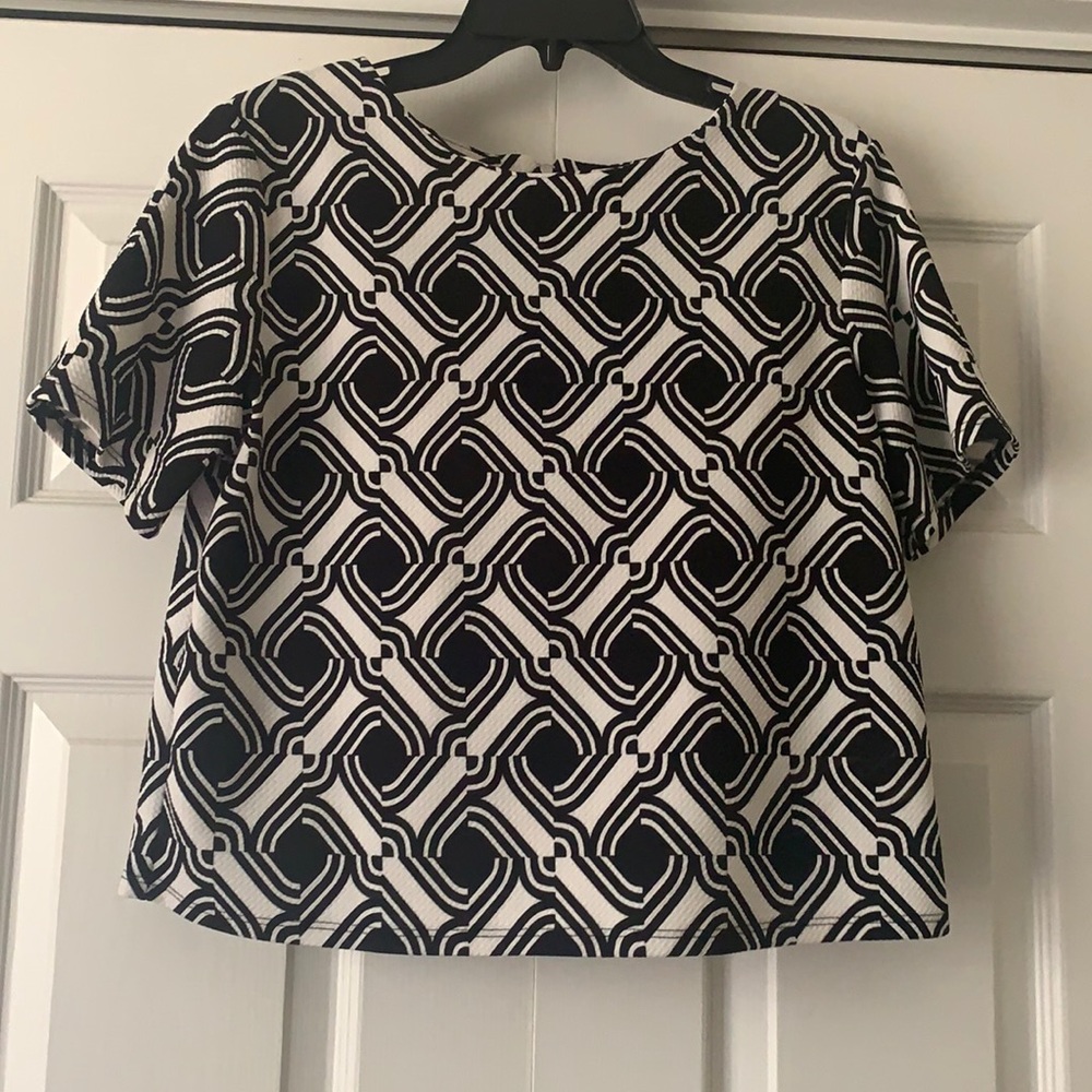 Black and white top by one clothing in size large.